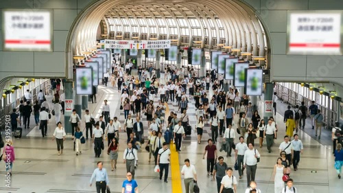 Timelapse of Rush Hour Commuters at Station in Tokyo -Tilt Down-