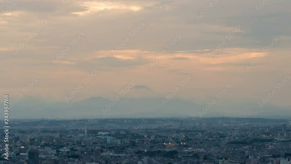 Timelapse of Day to Night Transition of Mt. Fuji over Tokyo -Tilt Down- Timelapse of Day to Night Transition of Mt. Fuji over Tokyo -Tilt Down-