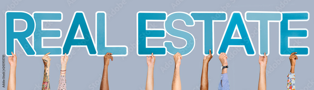Blue letters forming the word real estate