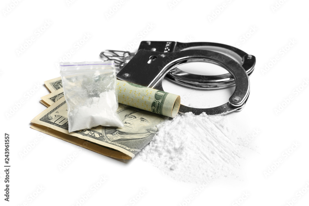 Cocaine, money bills and handcuffs on white background Cocaine, money bills and handcuffs on white background