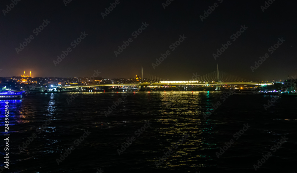Night view of the Bosphorus Strait and Galata Bridge in Istanbul, Turkey