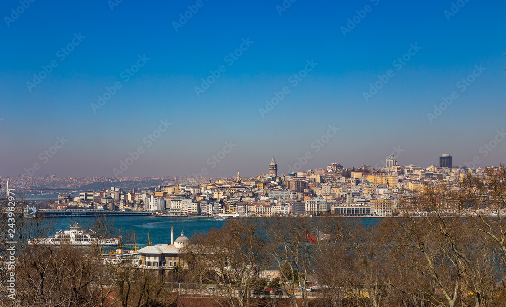View of the Bosphorus Strait, Galata Bridge and Galata Tower in Istanbul, Turkey