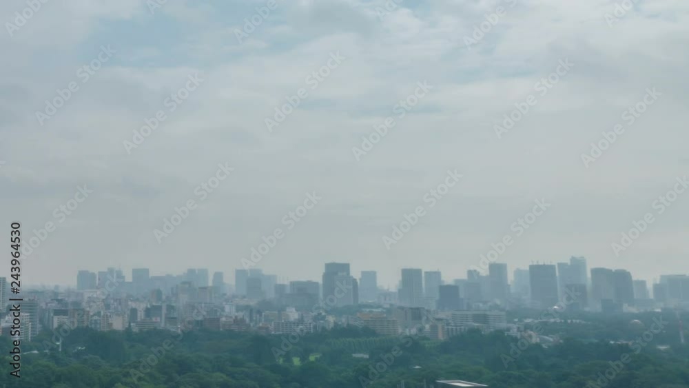 Timelapse of City Skyline over Urban Forest in the Daytime in Tokyo -Long Shot- Timelapse of City Skyline over Urban Forest in the Daytime in Tokyo -Long Shot-