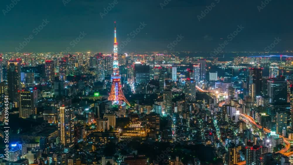 Timelapse of Iconic Tokyo Tower in Vast Sea of City Lights -Pan Right-