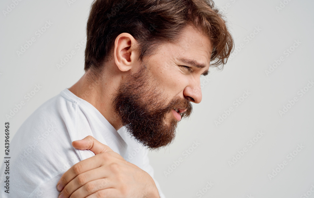 Fototapeta premium the man has a shoulder pain