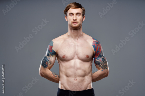 strong man cubes on the body muscles tattoo
