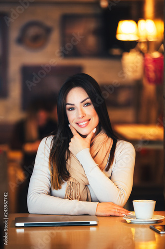 Portrait of attractive woman looking at camera © Etoilestars