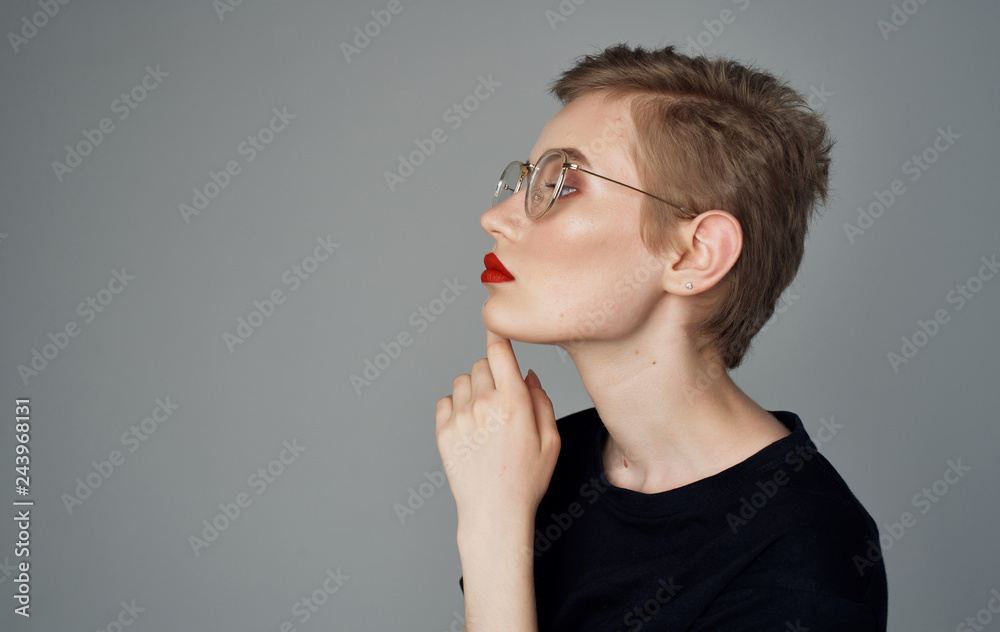 woman with glasses in profile woman with glasses in profile