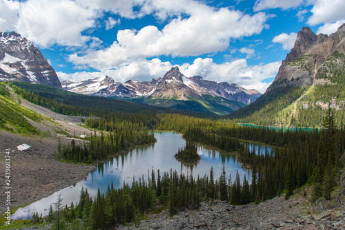 Opabin lake beautiful hiking trail in cloudy day in Spring, Yoho, Canada © nuinthesky