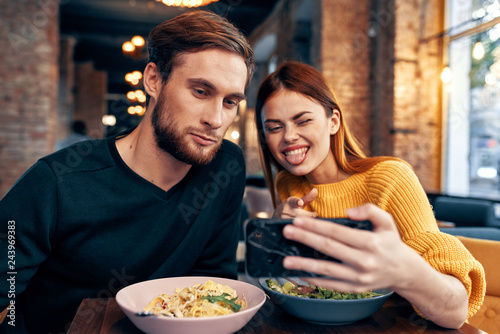 young couple selfie in cafe