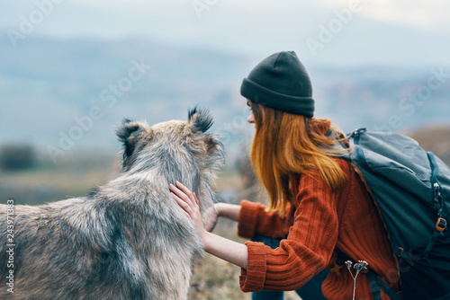 woman sitting with a dog © SHOTPRIME STUDIO
