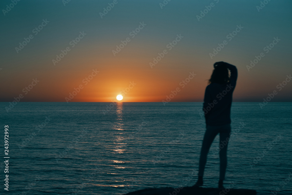 sunset sea woman