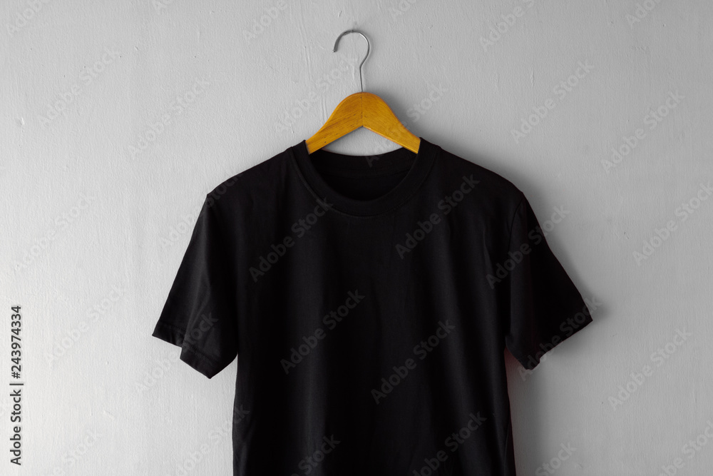Black t shirt in hanger store