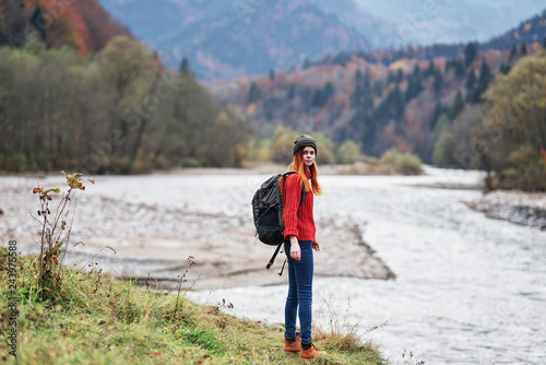 woman with a backpack in nature © SHOTPRIME STUDIO