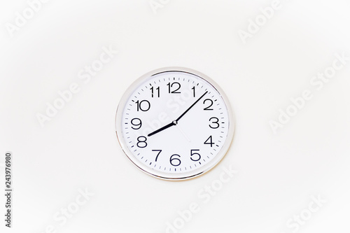 Modern wall clock isolated on white background with clipping path.with copy space.