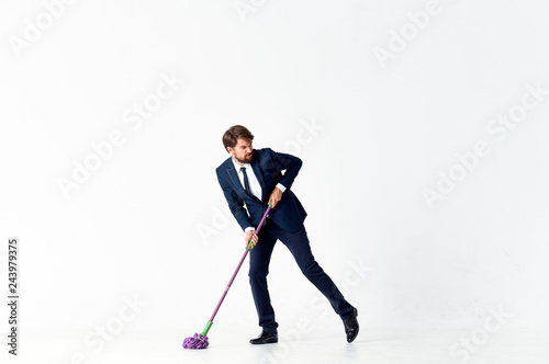 business man washes the floor