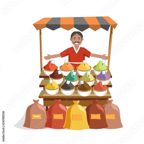 Street wooden counter with exotic spices and friendly seller.