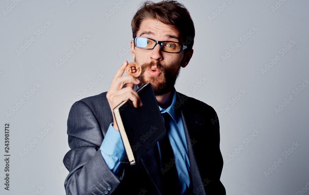 surprised business man with Bitcoin glasses surprised business man with Bitcoin glasses