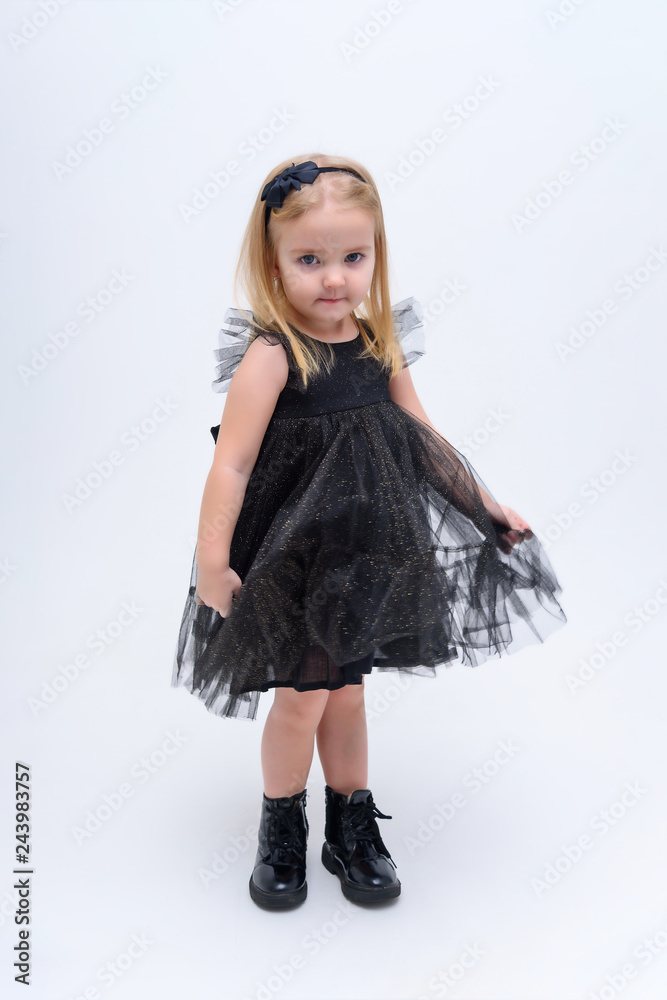 Concept portrait of a cute little girl in fashionable clothes. beautiful child Concept portrait of a cute little girl in fashionable clothes. beautiful child