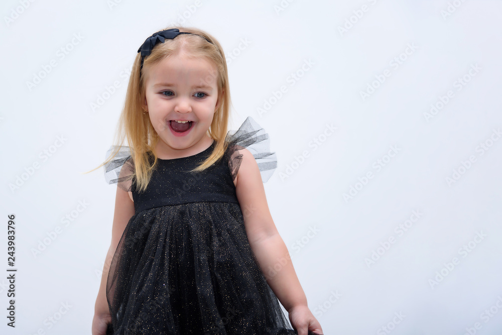 Concept portrait of a cute little girl in fashionable clothes. beautiful child Concept portrait of a cute little girl in fashionable clothes. beautiful child