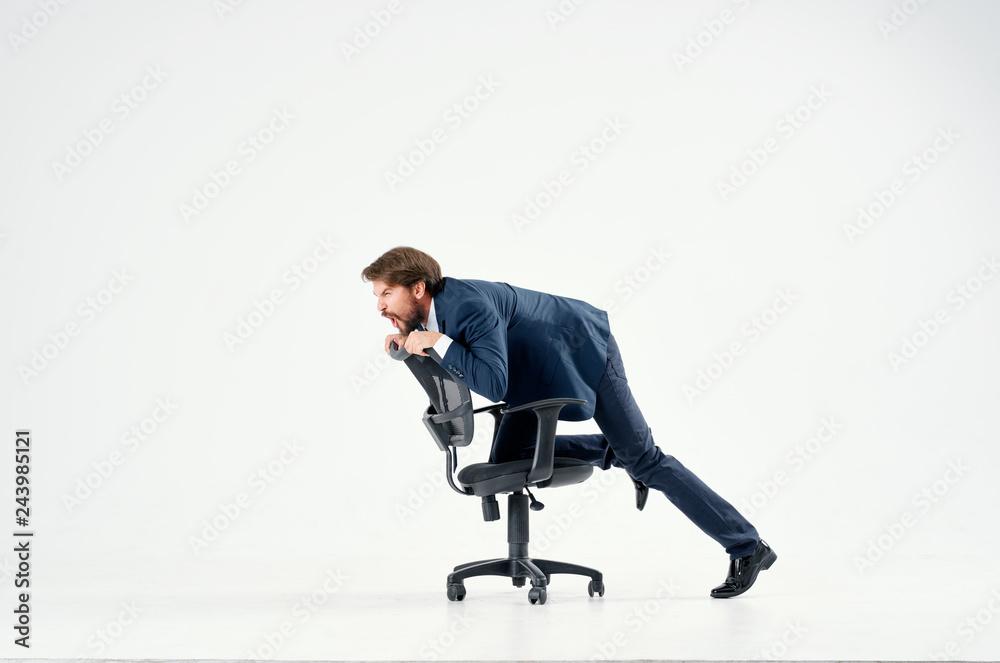 business man riding his chair on a white isolated background business man riding his chair on a white isolated background