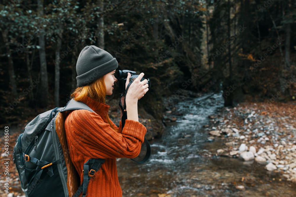 woman takes pictures of nature