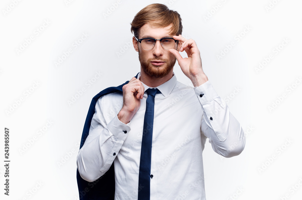 serious business man in glasses with jacket on a white background serious business man in glasses with jacket on a white background