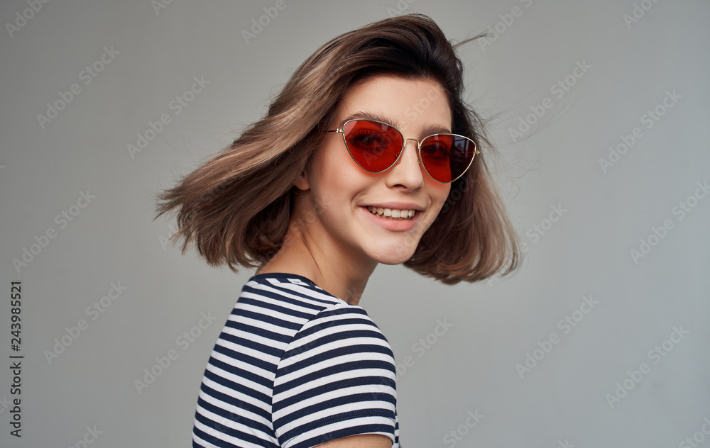 woman with a short haircut in glasses portrait