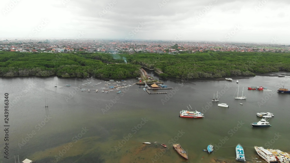 Aerial view drone video of mangroves on Bali island, Indonesia. Serangan island.