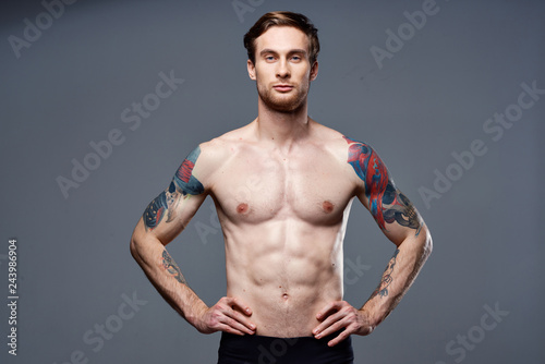muscular man tattoo