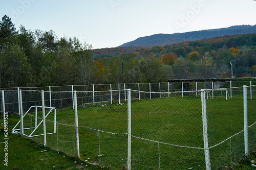 Image of a training football field in a mountain village.