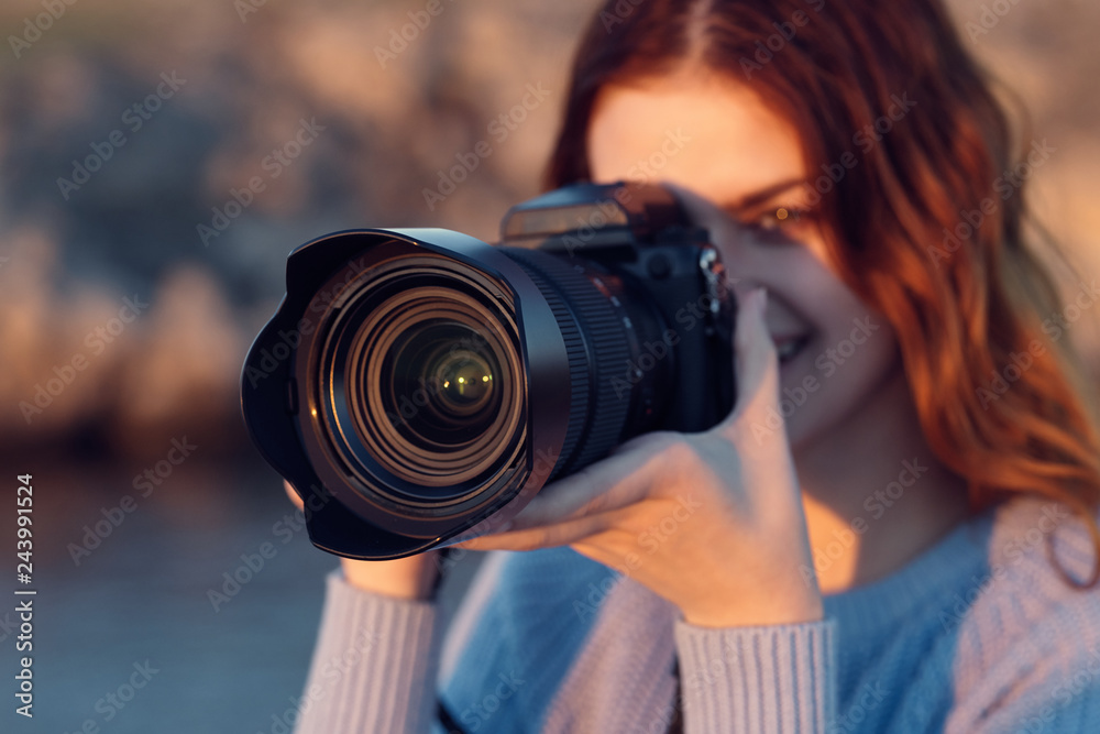 woman taking photo with digital camera
