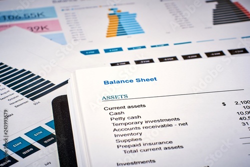 balance sheet on the background of financial documents, close-up