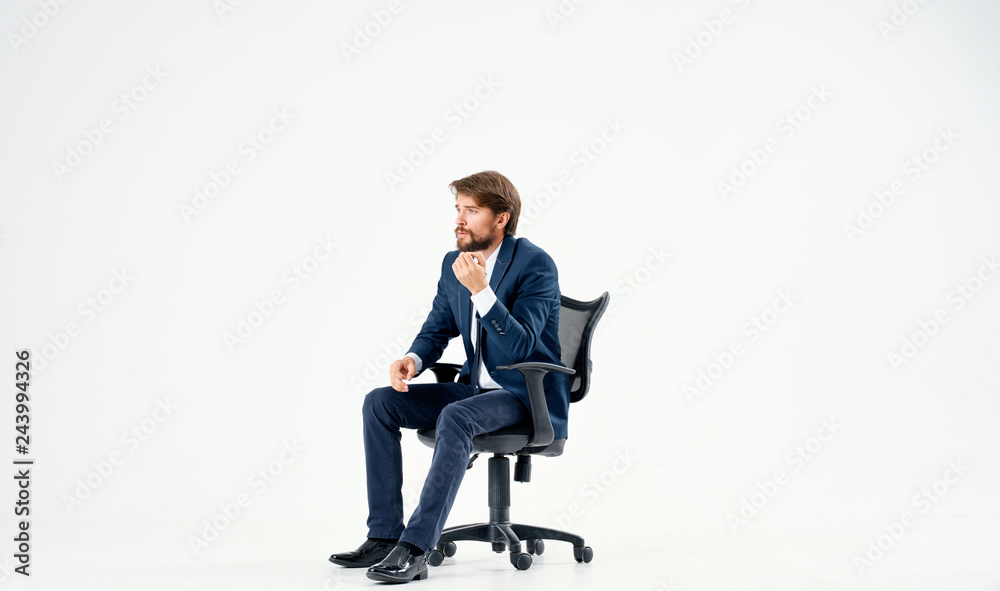 business man sitting on a chair on a white background Stock Photo | Adobe  Stock