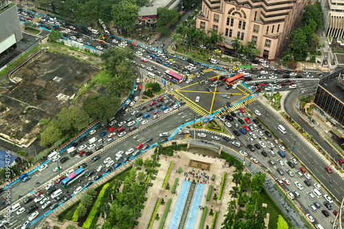 Aerial view looking down onto very busy intersection with heavy traffic