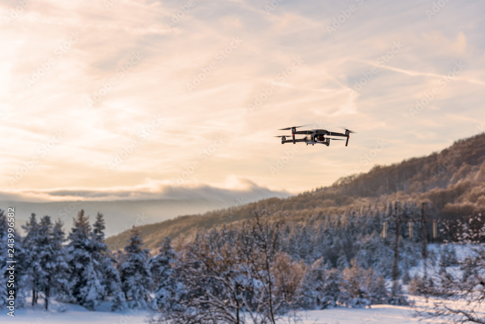 Flying drone like Mavic 2 Pro. - obrazy, fototapety, plakaty 