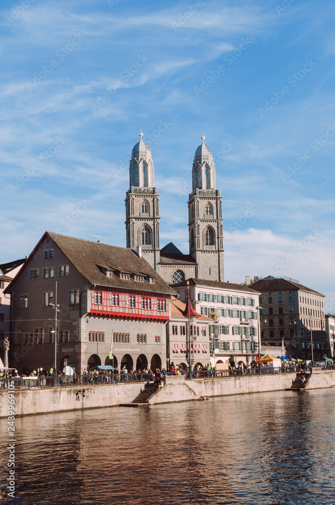 Fototapeta premium Old Grossmunster cathedral and medieval buildings in Zurich Old town Altstadt