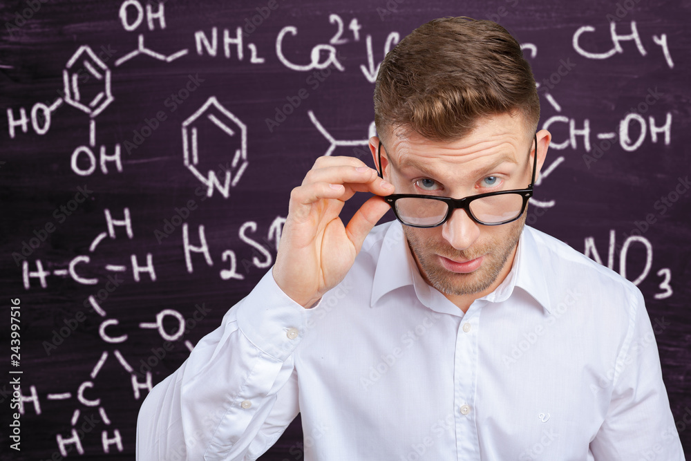 handsome man wearing glasses, studio shot