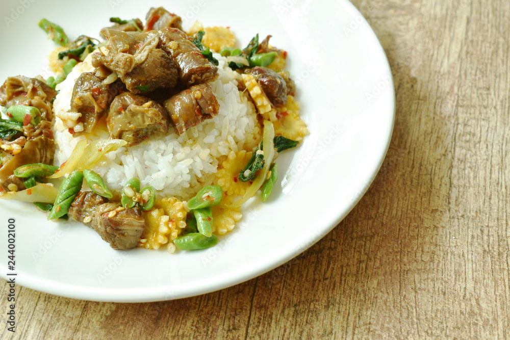 spicy stir fried braised pork with basil leaf on rice spicy stir fried braised pork with basil leaf on rice