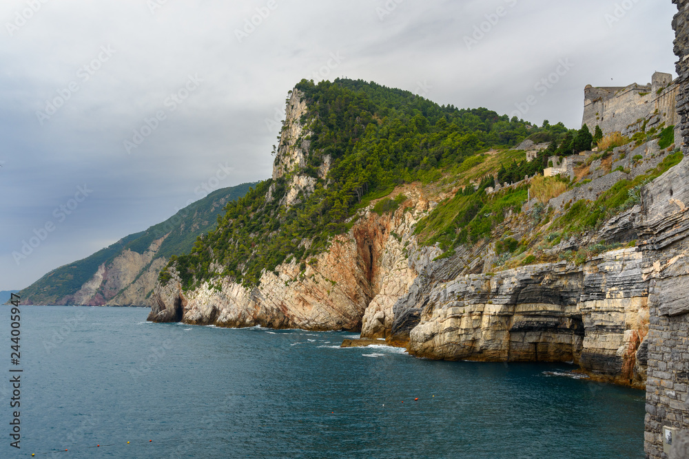 Cliff sea coast with Grotta di Lord Byron in Portovenere or Porto Venere town on Ligurian coast. Italy