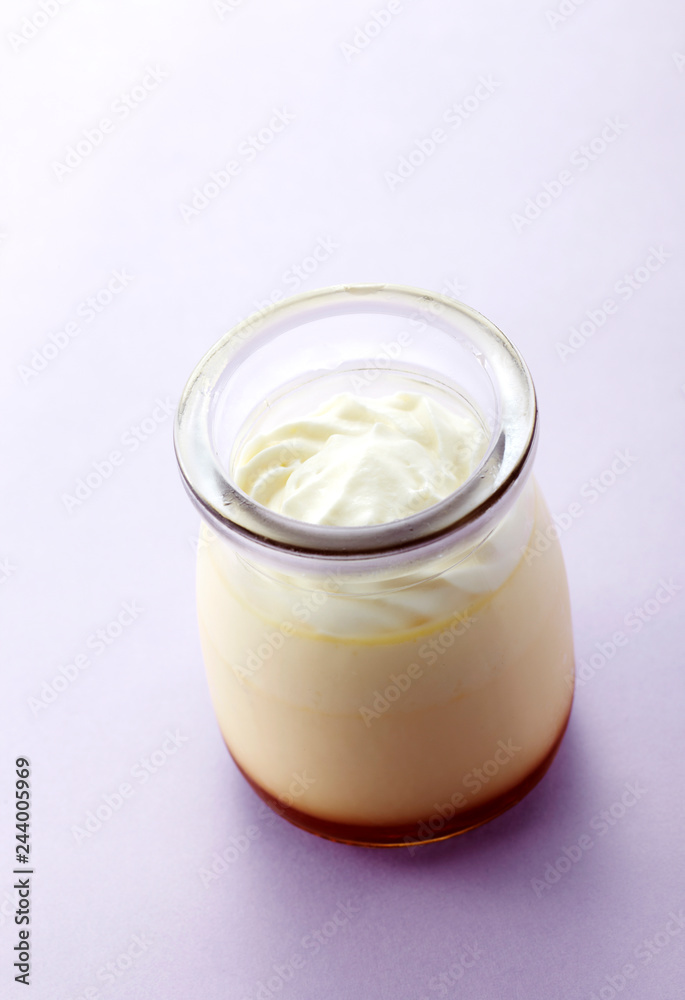 Delicious creamy pudding on a white background Delicious creamy pudding on a white background