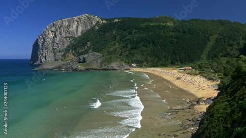 Playa de Laga, Spain. Panoramic view of a beach on the coast of Bay of Biscay of Atlantic Ocean. photo