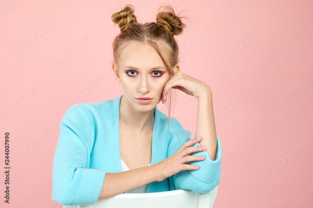 Beautiful blonde female looks aside with bewilderment, poses against pink background. Body language and face expression - Image Beautiful blonde female looks aside with bewilderment, poses against pink background. Body language and face expression - Image