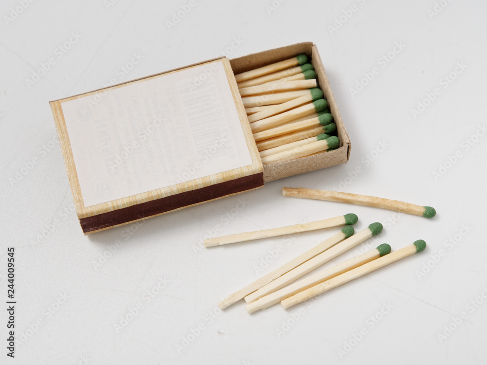 matches sulfur in a cardboard box on a white background. matches sulfur in a cardboard box on a white background.