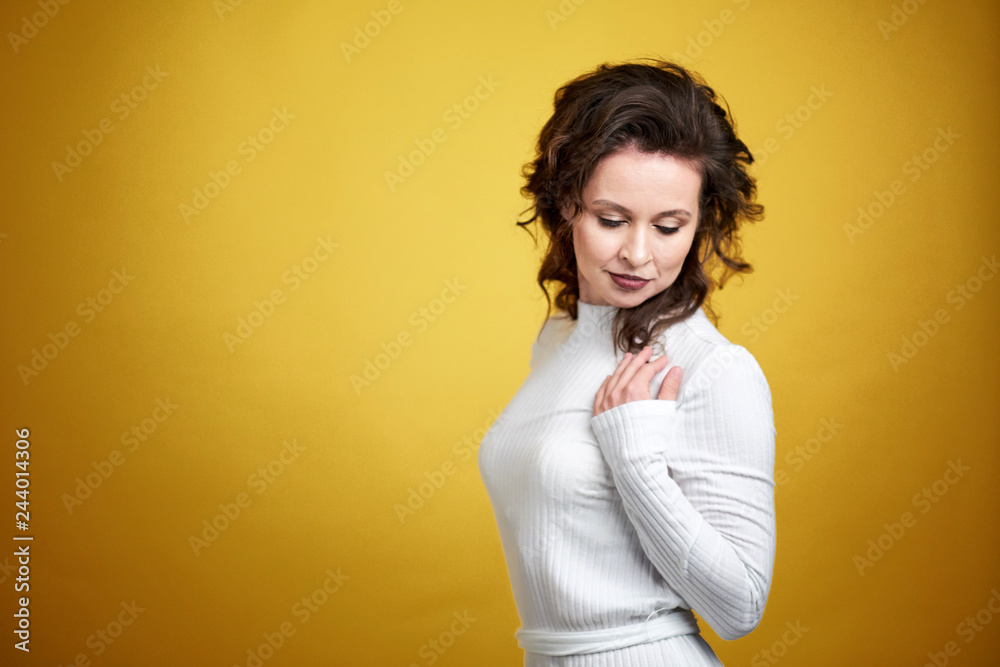 Portrait of a middle aged woman looking confused. sad pensive face