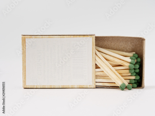 matches sulfur in a cardboard box on a white background. photo