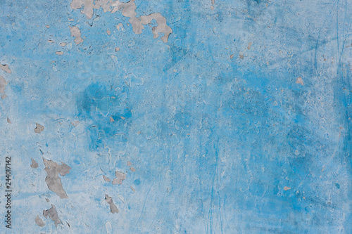 Blue painted old cement wall. Abstract grunge texture background