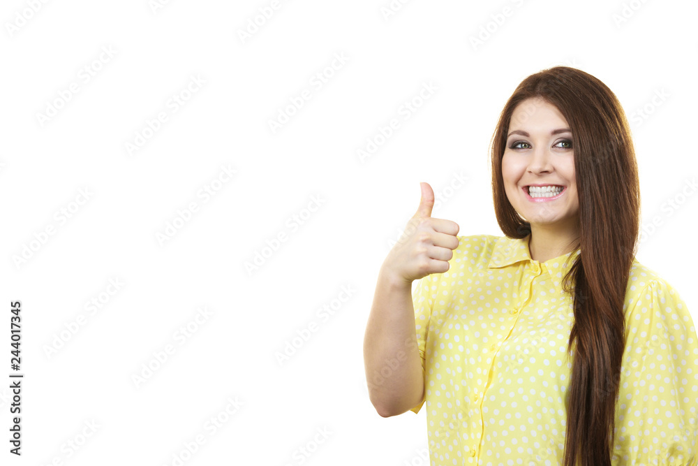 Cheerful woman showing thumb up Cheerful woman showing thumb up