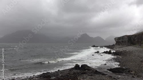 Elgol beach at Port na Cullaidh with Red Cuillin Mountains under clouds on Loch Scavaig Scottish Highlands Isle of Skye - Scotland UK photo