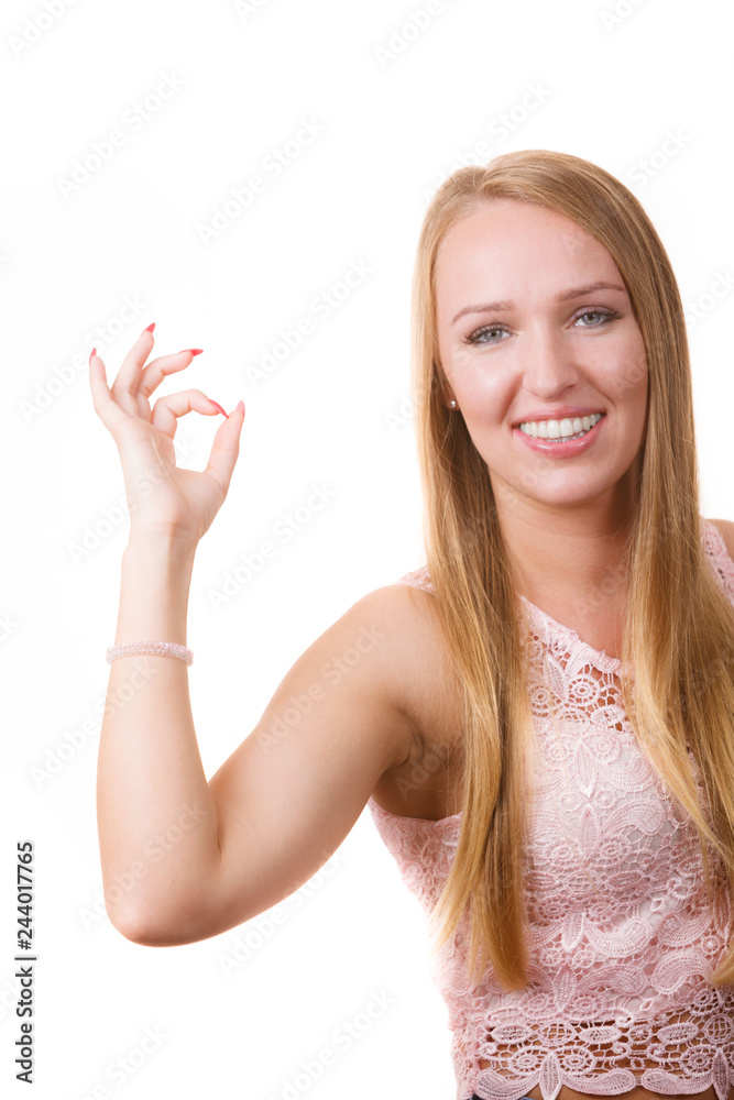 Fototapeta premium Woman showing a ok gesture